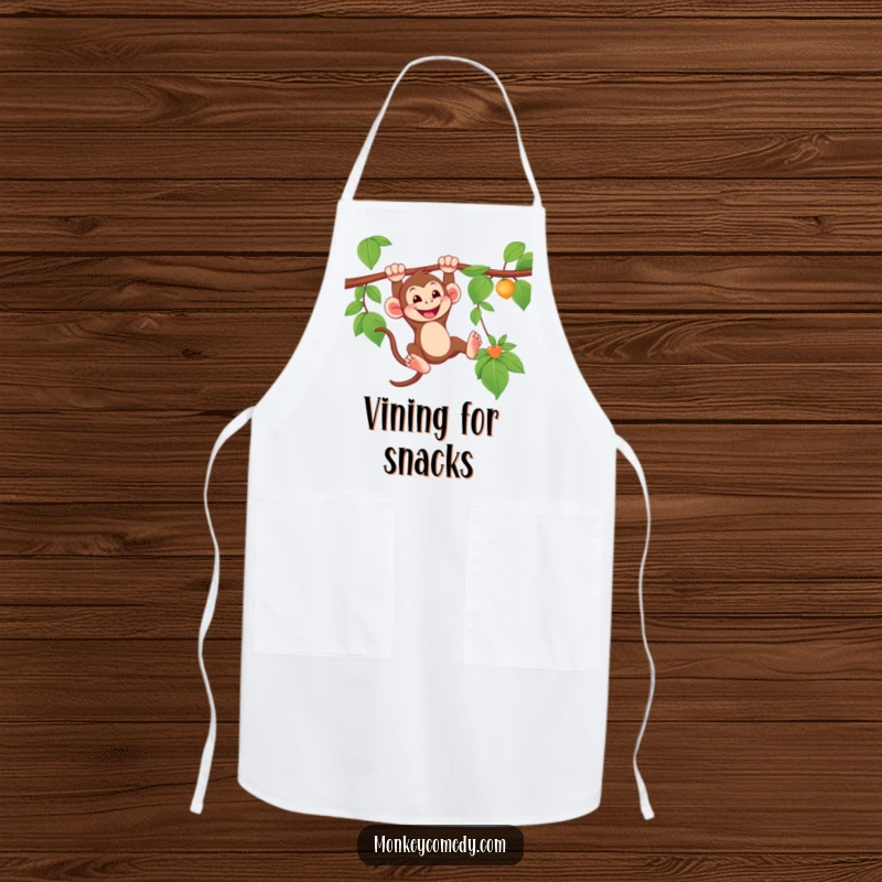 Funny Monkey Apron with a grinning monkey swinging from a vine, perfect for adding jungle humor to cooking.
