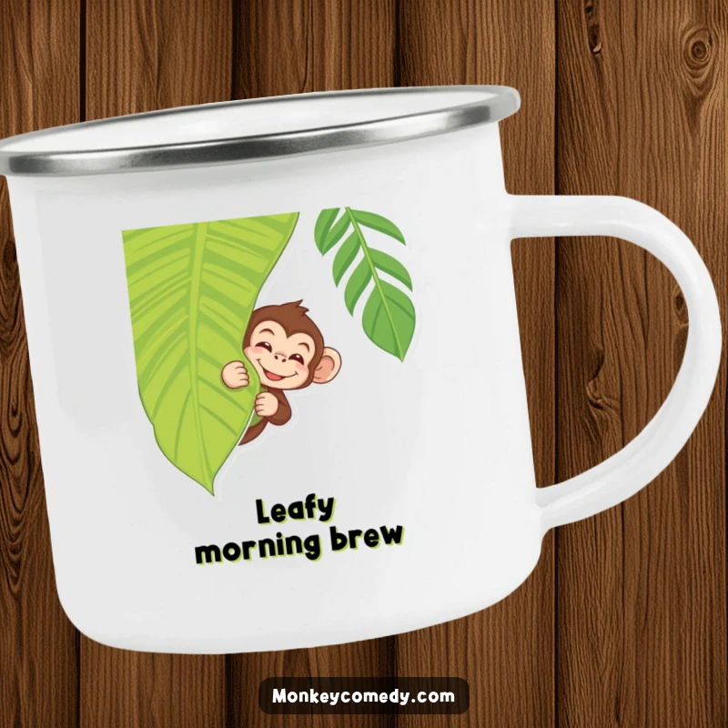 Funny Monkey Camping Mug featuring a monkey peeking with a wink from behind a tropical leaf, great for outdoors.