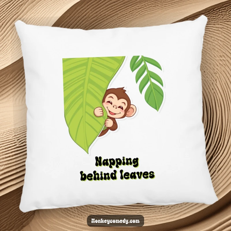 Playful Monkey Pillow featuring a monkey peeking with a wink from behind a tropical leaf, comfortable and humorous.