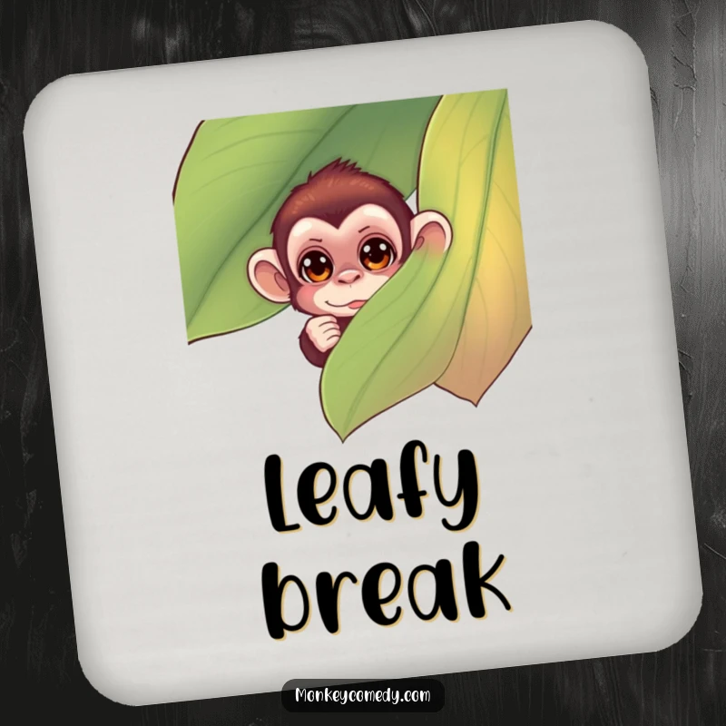 Funny monkey drink coaster featuring a small monkey with curious eyes peeking from behind a large, colorful leaf, adding humor to tables.