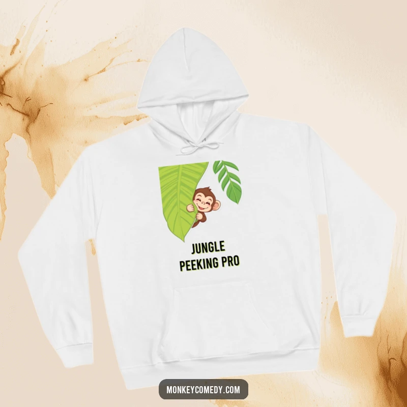 Cozy Monkey Wink Hoodie depicting a monkey peeking with a wink from behind a tropical leaf, warm and humorous.