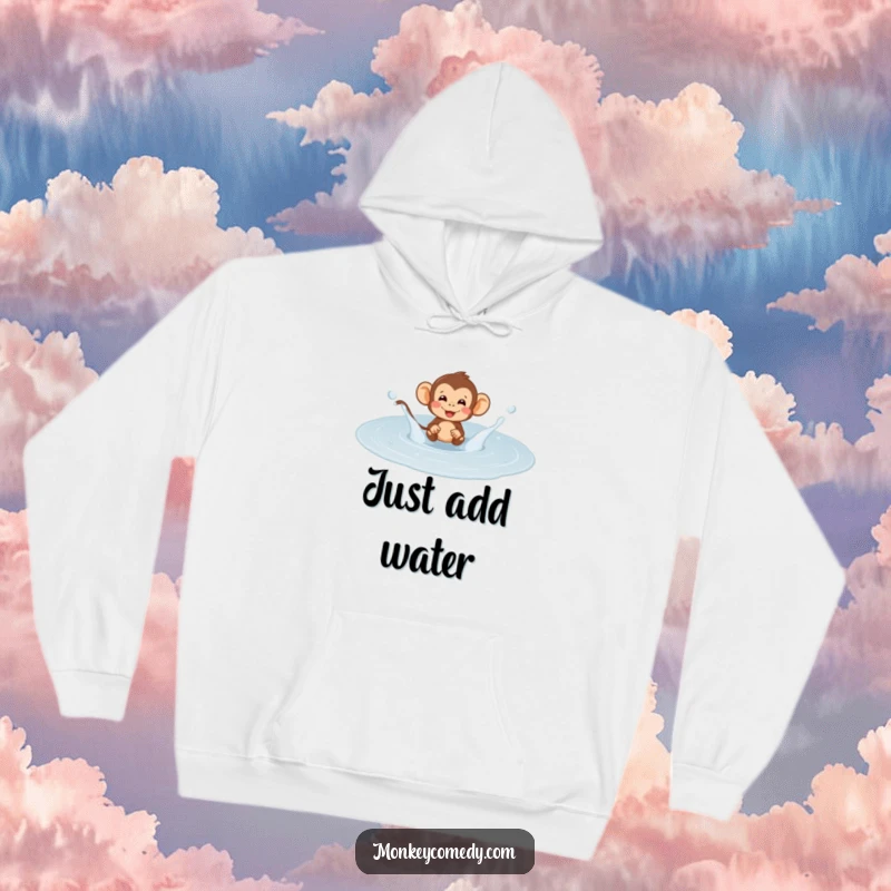 Funny monkey puddle splash hoodie, featuring a primate joyfully jumping and splashing in a large puddle, cozy and amusing.