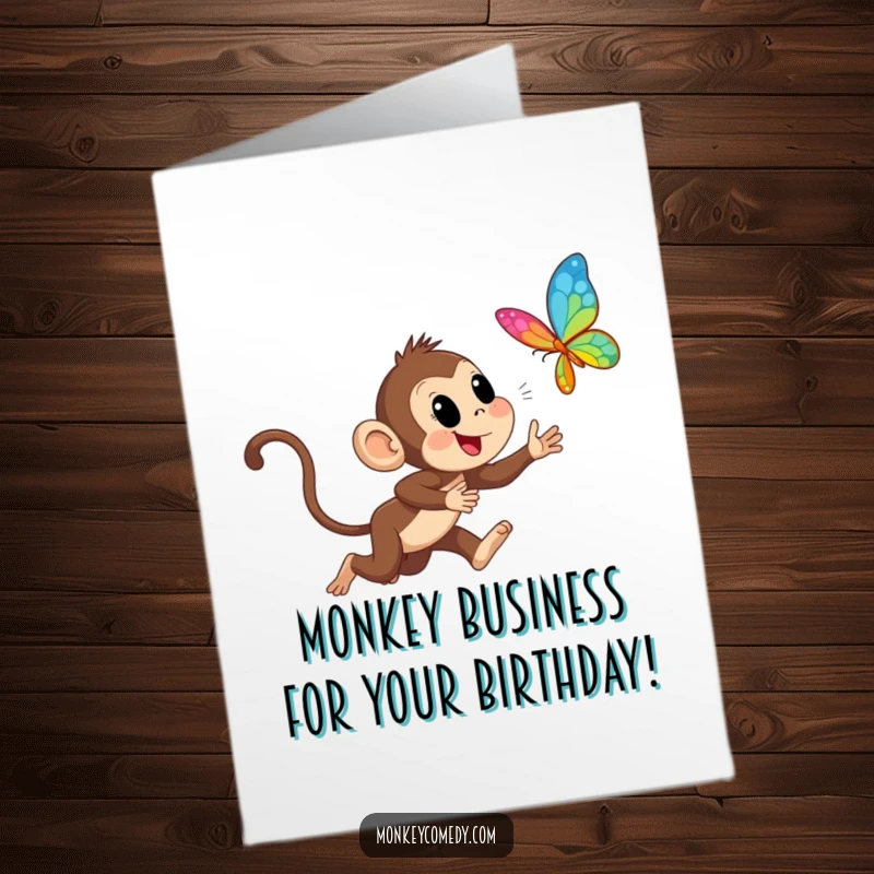 Funny Free Printable Birthday Card: Energetic monkey joyfully chasing a vibrant butterfly, pure excitement captured for your celebration.