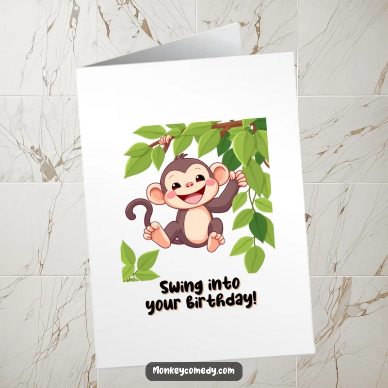 Funny Free Printable Birthday Card: a happy kawaii monkey with a wide grin, enthusiastically swinging on a vine.