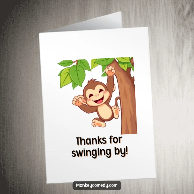 Funny Free Printable Thank You Card: A cute monkey with a wide, cheeky grin, captured mid-swing from a vine.