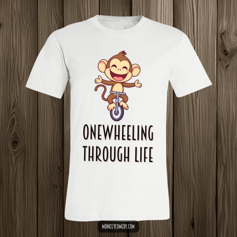 Funny Monkey T-Shirt: A joyful monkey rides a unicycle with a large, proud smile, showcasing balance and glee.