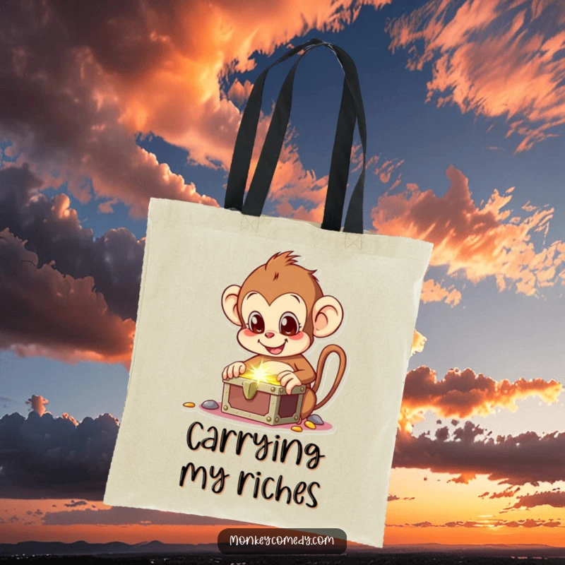 Funny tote bag showing a thrilled monkey discovering a chest full of glittering treasures, perfect for explorers.