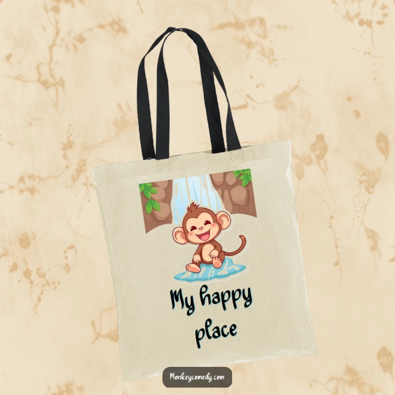 Funny tote bag depicting a gleeful monkey sliding down a waterfall, ideal for beach trips or daily adventures.