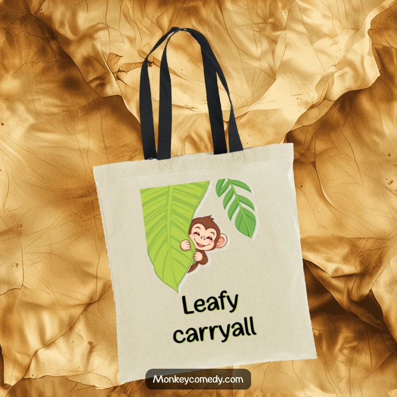 Jungle Monkey Tote Bag showing a monkey peeking with a wink from behind a tropical leaf, a fun accessory.